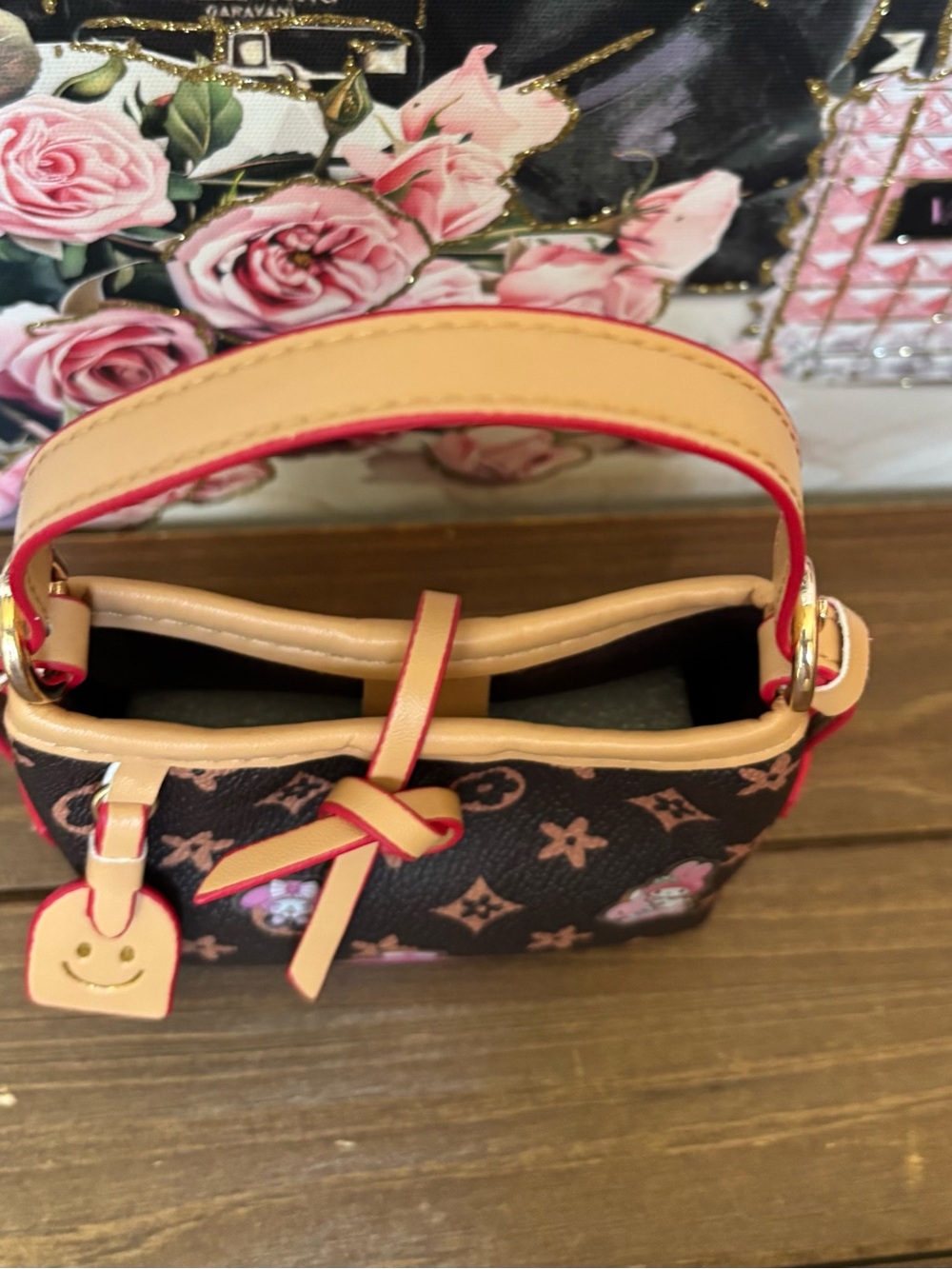 Brown Patterned Bucket Mini Bag with Tan accents. - Picture 2 of 3